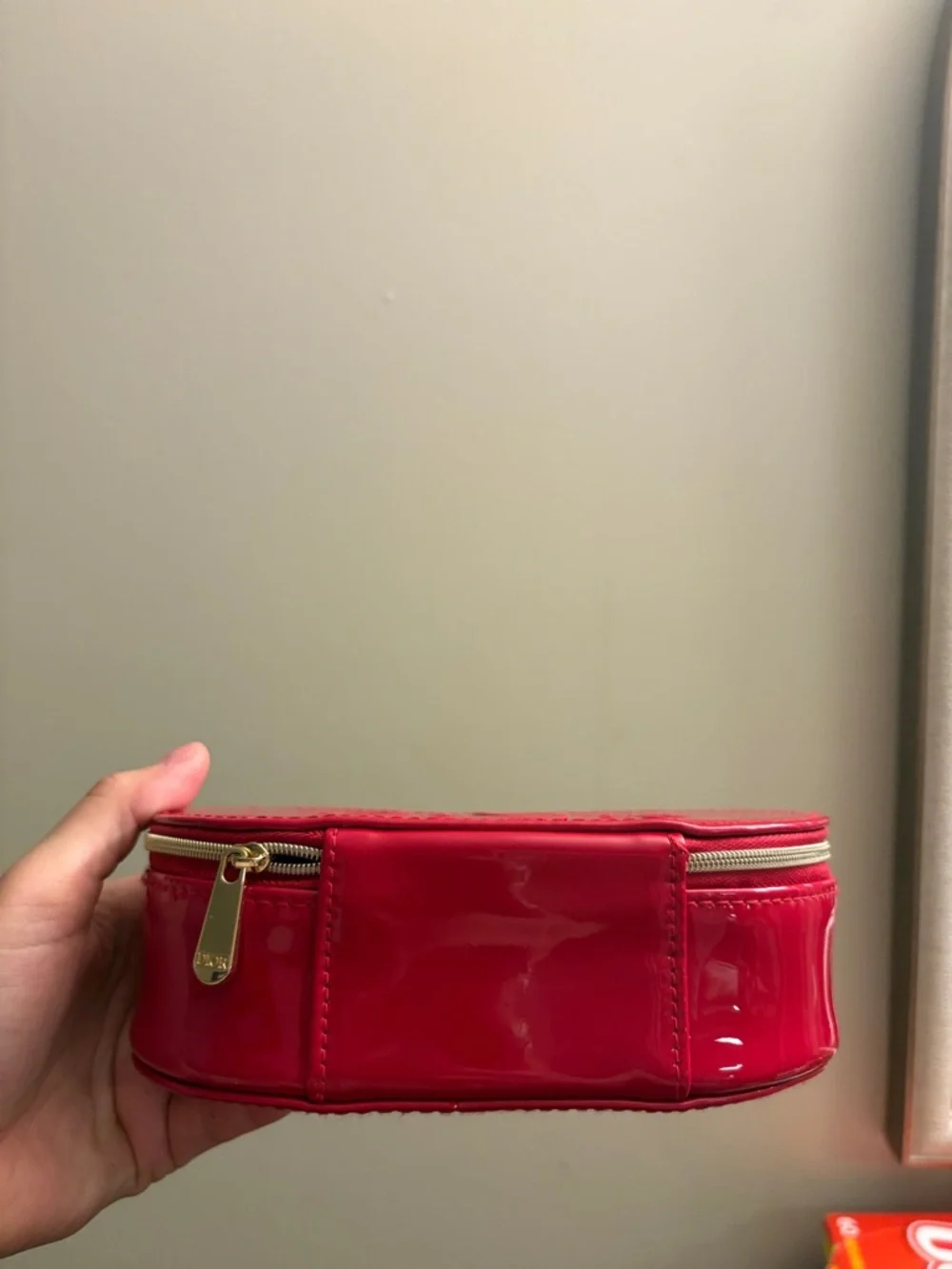 Dior Red Patent Oval Cosmetic Case with Embossed Logo